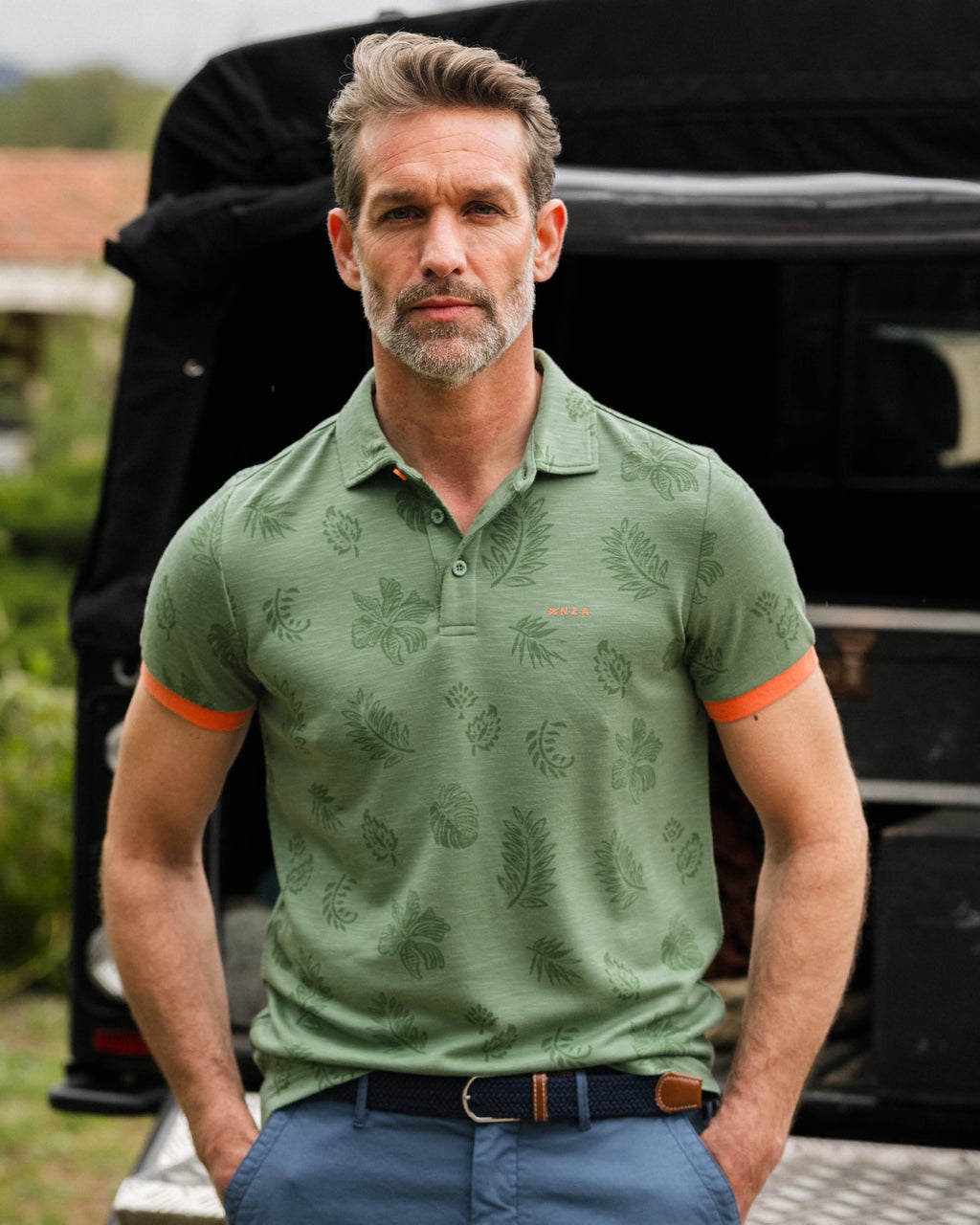 GREEN POLO SHIRT WITH LEAF PRINT