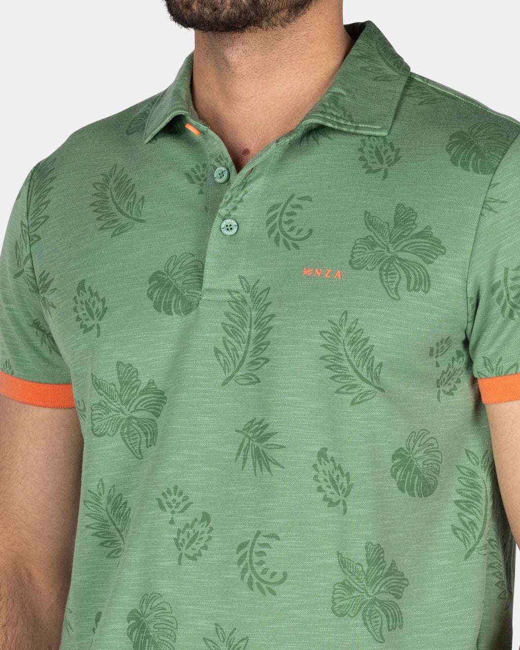 GREEN POLO SHIRT WITH LEAF PRINT